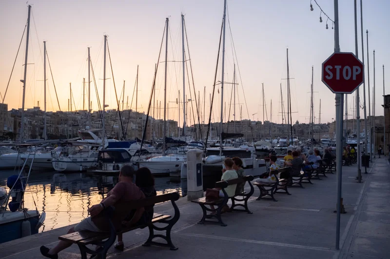 Locals appreciating the sun set, with a gelato in hand