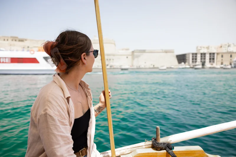 The journey across the bay on a water taxi is a wonderfully scenic one
