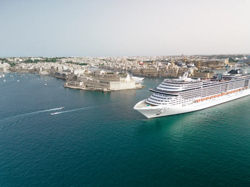 One of many cruise ships visiting Valetta, Malta, leaving the harbour